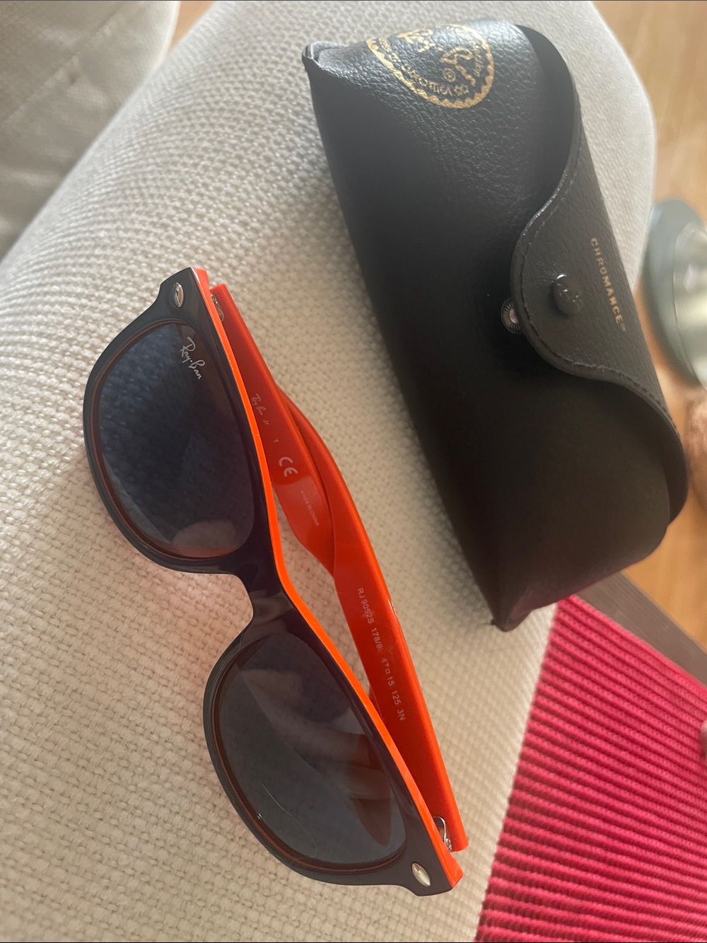 Ray-Ban Sunglasses in Black and Bright Orange Temples
